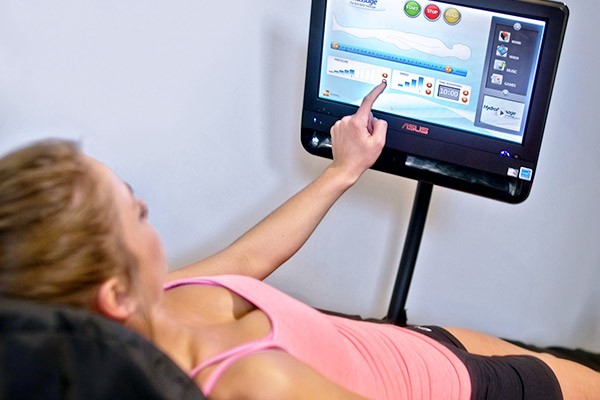 Woman using HydroMassage bed