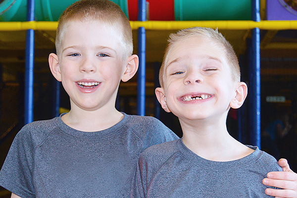 Two children enjoying Kids' Night Out